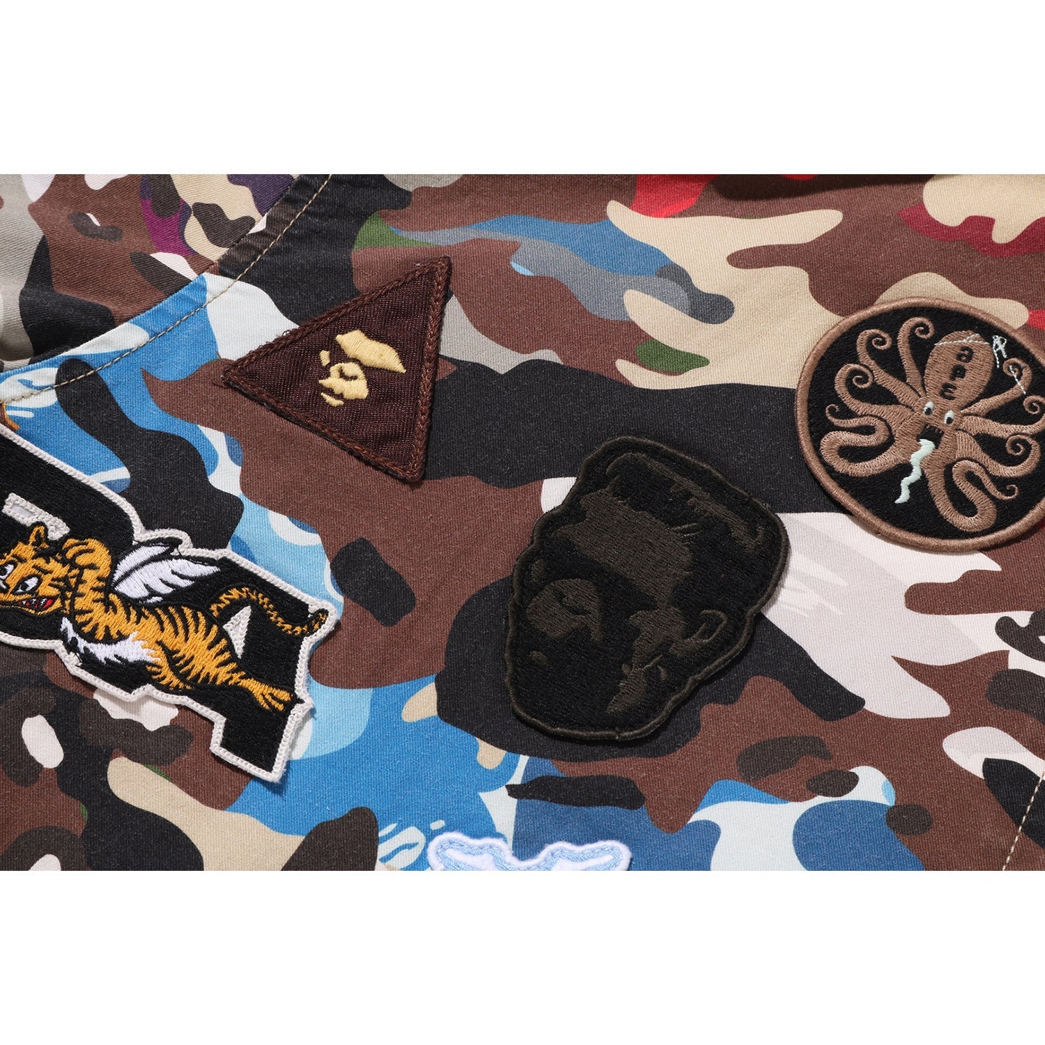HYBRID CAMO MULTI BADGE JACKET MENS