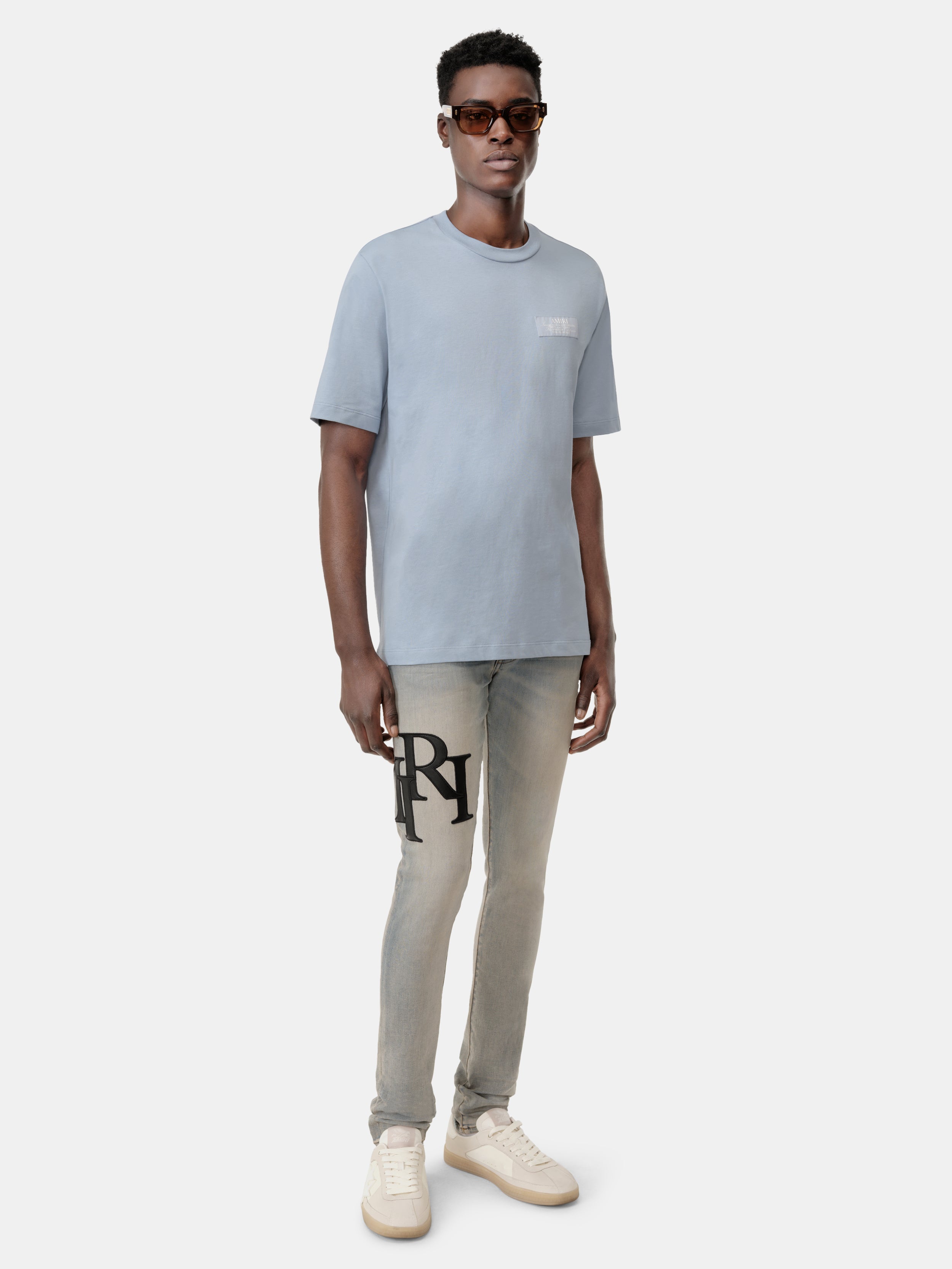 STAGGERED LOGO SKINNY JEAN - ANTIQUE INDIGO