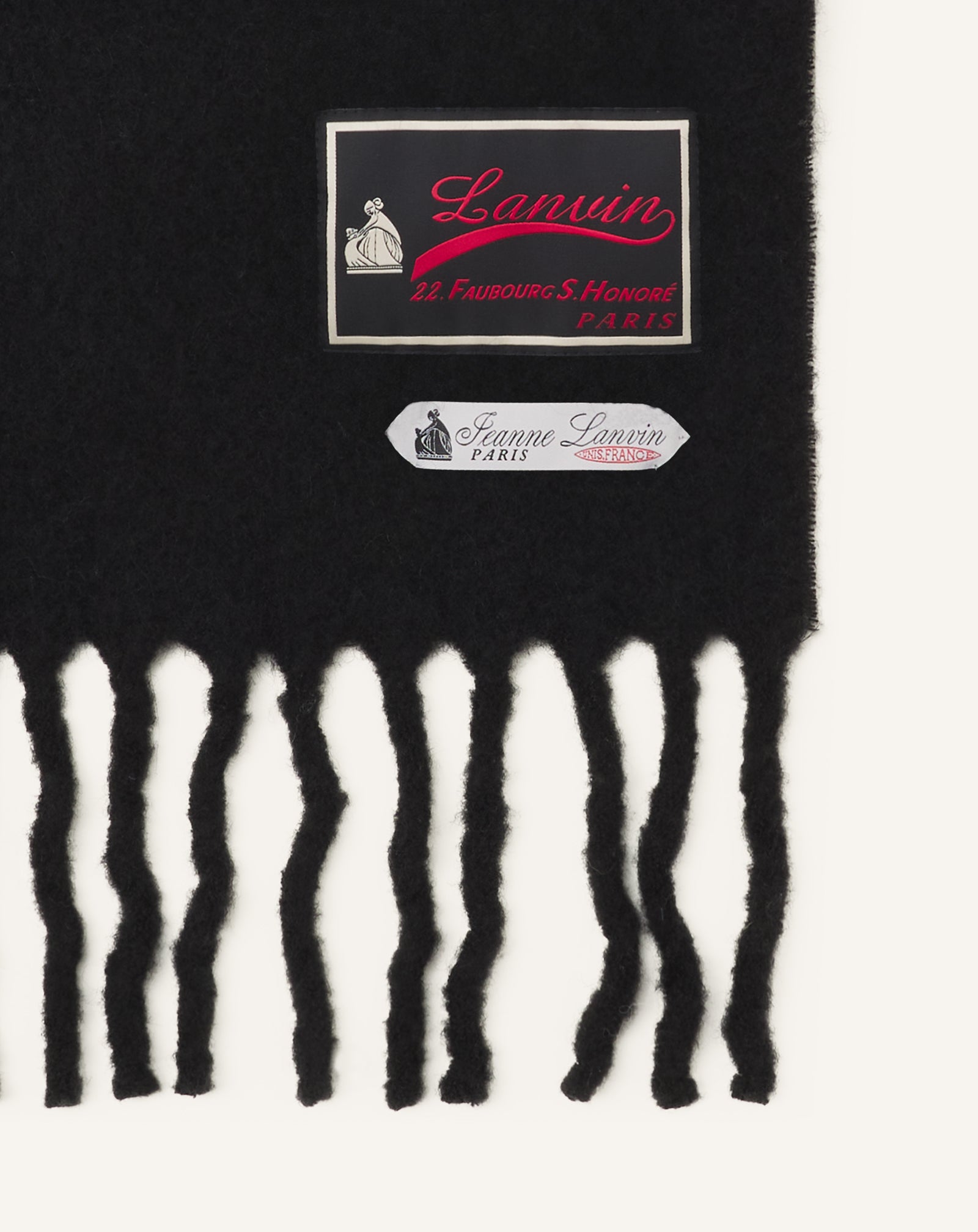 FRINGED WOOL SCARF WITH 22 FAUBOURG LABEL