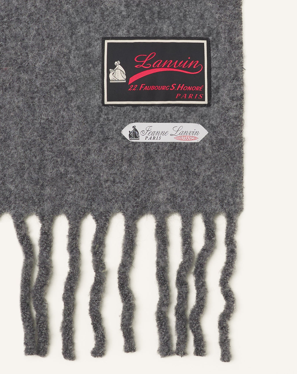 FRINGED WOOL SCARF WITH 22 FAUBOURG LABEL