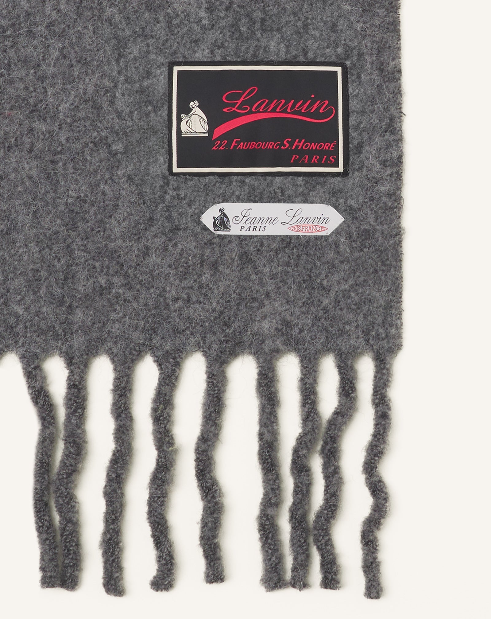 FRINGED WOOL SCARF WITH 22 FAUBOURG LABEL