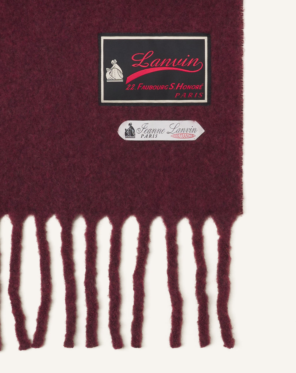 FRINGED WOOL SCARF WITH 22 FAUBOURG LABEL