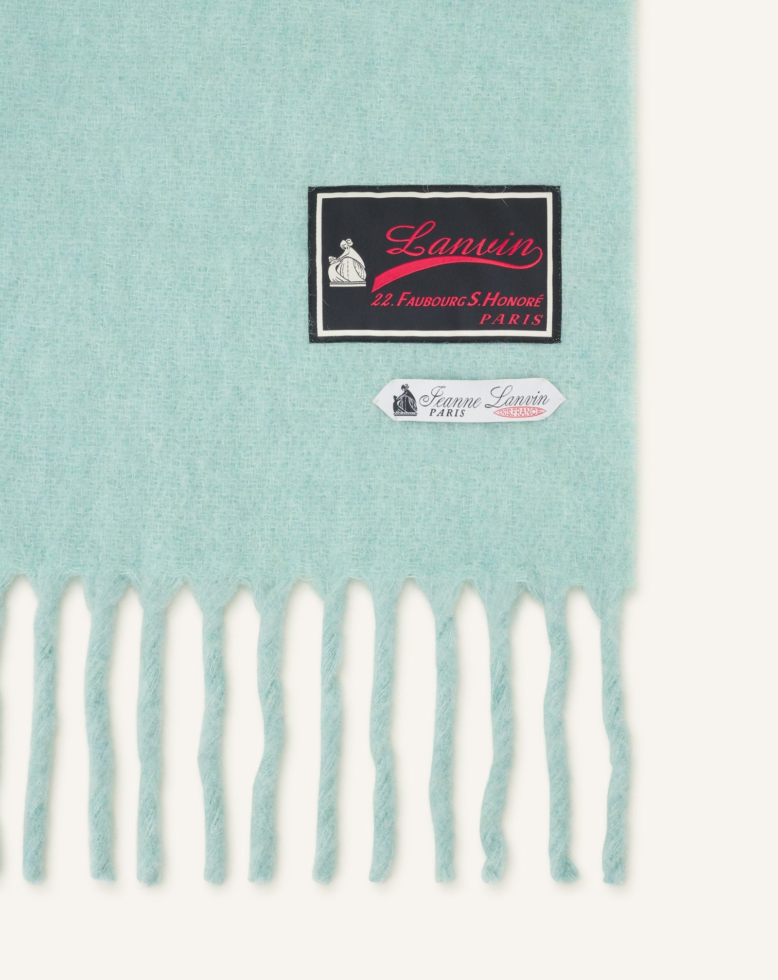 FRINGED WOOL SCARF WITH 22 FAUBOURG LABEL