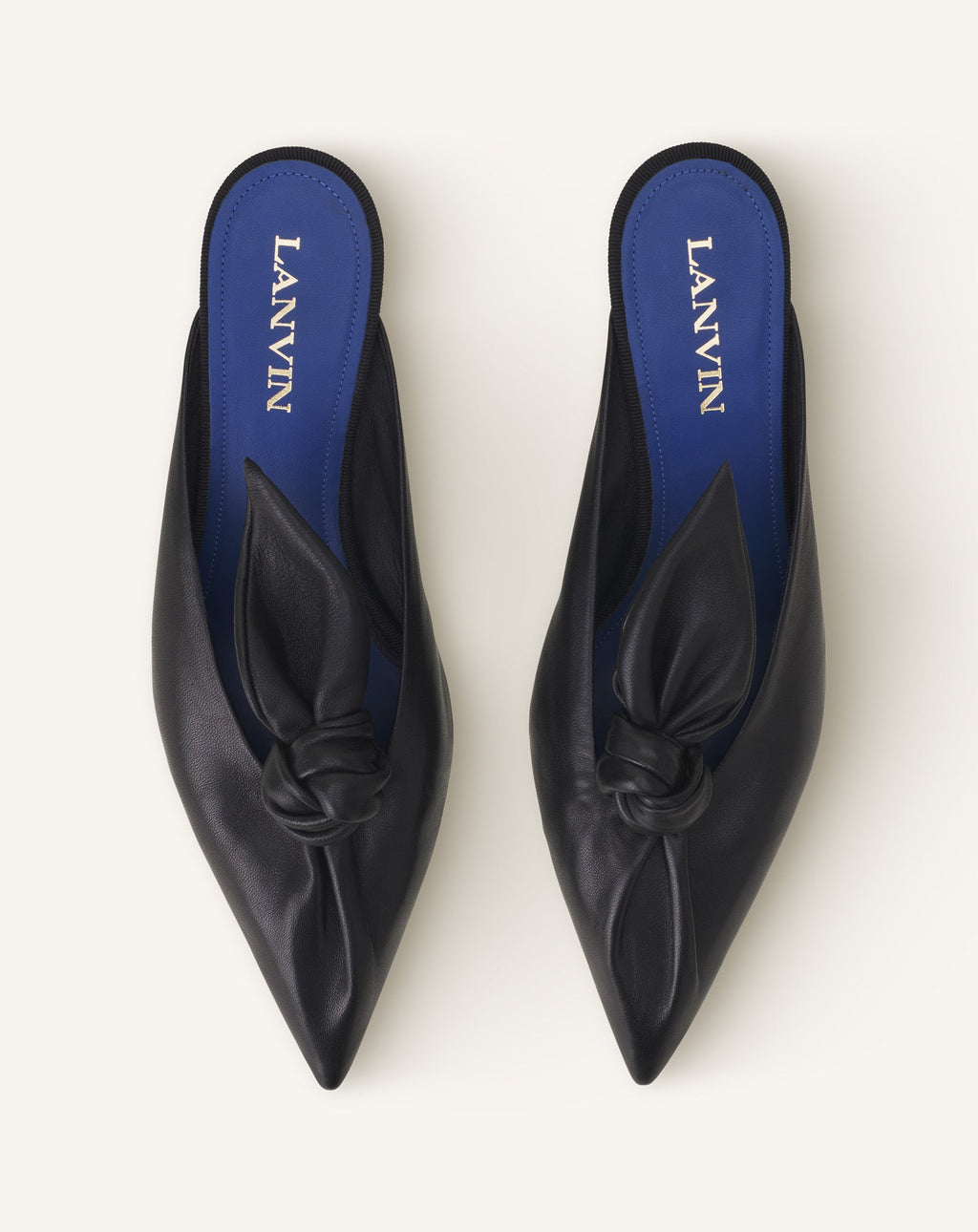 MIDNIGHT STEP HEELED MULES WITH A LEATHER BOW