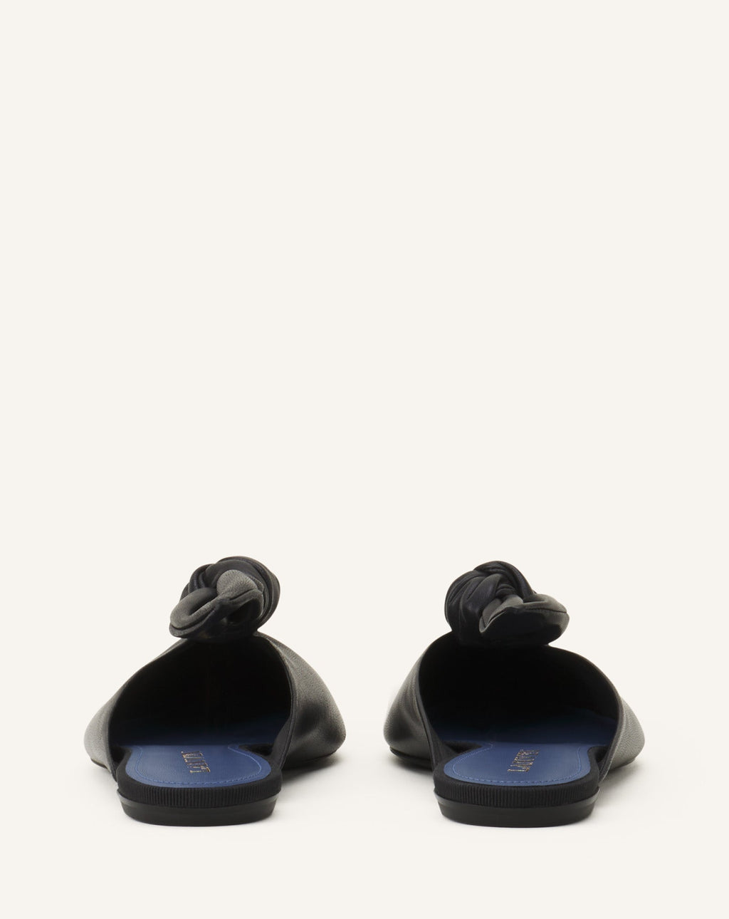 MIDNIGHT STEP MULE WITH A LEATHER BOW