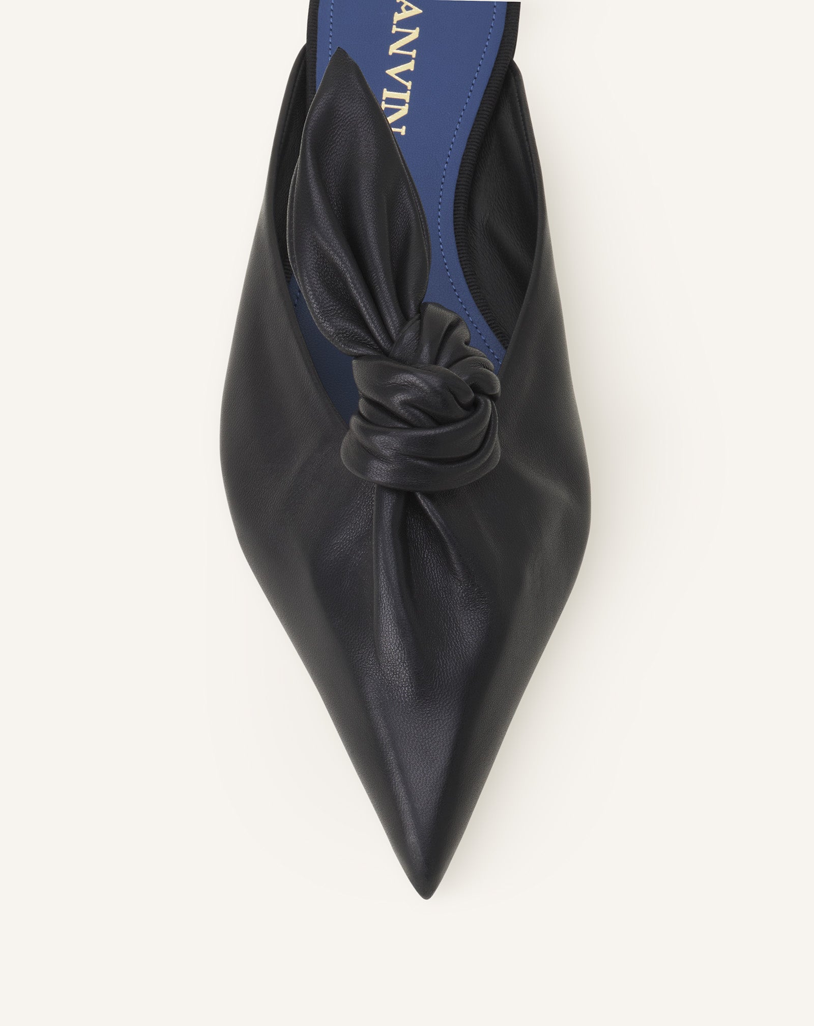MIDNIGHT STEP MULE WITH A LEATHER BOW