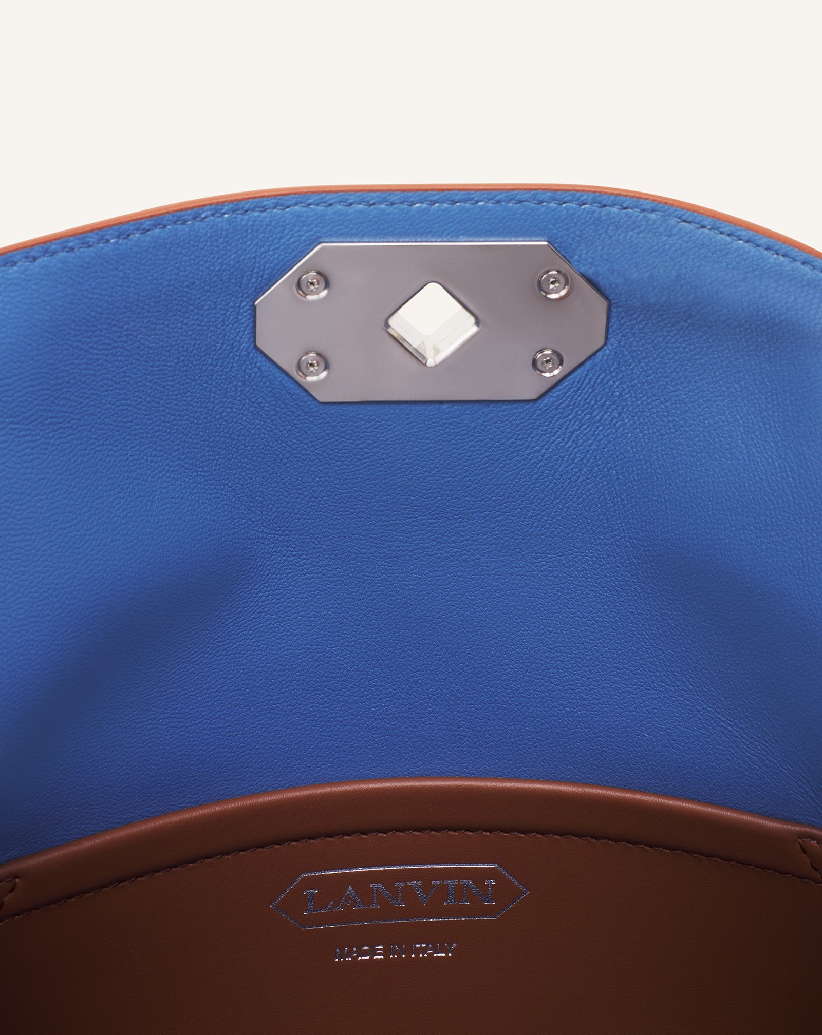 COMPAGNON CLUTCH BAG IN LEATHER